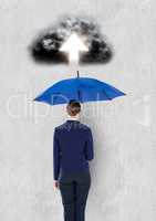 Digital composite image of cloud with arrow over businesswoman holding blue umbrella