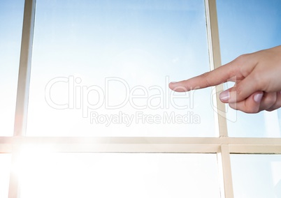 Hand touching air with window sky background
