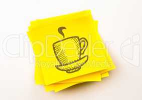 Brown coffee graphic against yellow sticky note