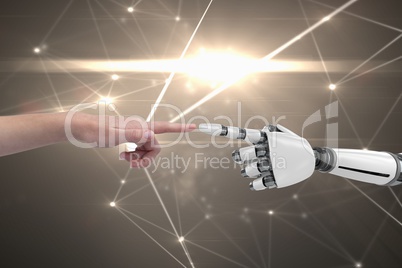 Human and robot touching their fingers in grey background
