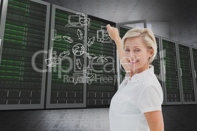 Businesswoman drawing against server room background