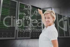 Businesswoman drawing against server room background