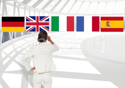 main language flags over businesswoman in the office