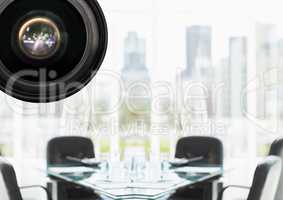 Focus on a CCTV with a blurred desk of the office