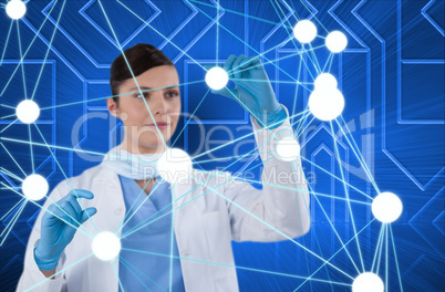 Doctor pointing at screen against blue background