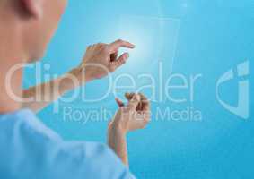 Doctor holding glass tablet and blue background