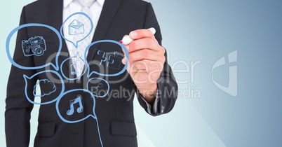 Business man mid section drawing blue speech bubble doodle against blue background