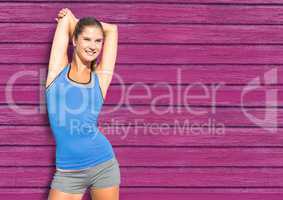 fitness woman with pink wood background