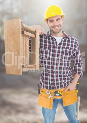 Construction Worker with ladder in front of construction site