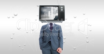 Businessman with TV on face standing against abstract background