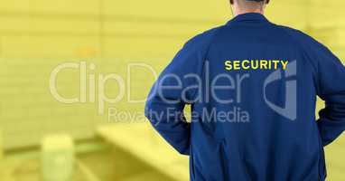 Security man on yellow background building site