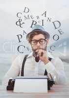 Hipster man  on typewriter with letters and blue mountain landscape