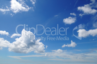 blue sky and cumulus clouds