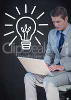 Business man with laptop against white lightbulb graphic and navy background