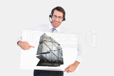 Businessman with hands free kit holding plans