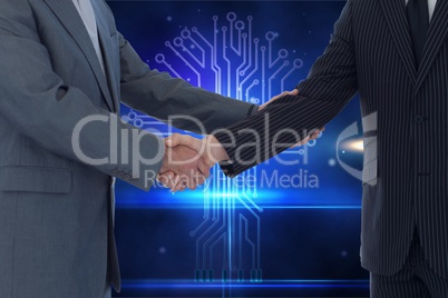 Businessmen shaking their hands with digital background
