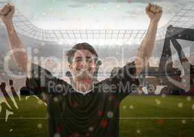 soccer player celebrating the victory with the fans.