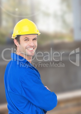 Construction Worker in front of construction site