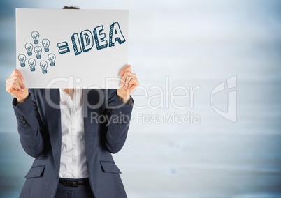 Business woman with card over face and blue idea doodle against blurry blue wood panel