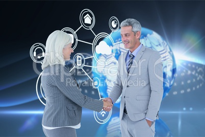 Business partners shaking their hands