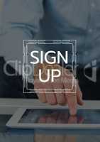 Sign up text and graphic against close up of hand touching tablet and dark overlay