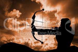 Archery player in front of cloudy background