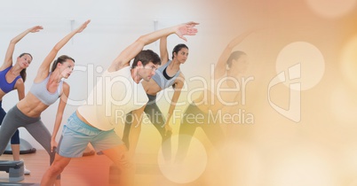 People stretching and orange bokeh transition