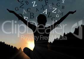 woman sit in the mountain silhouette with text over. Sunset