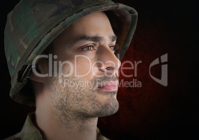 foreground of soldier side-face. red and black background
