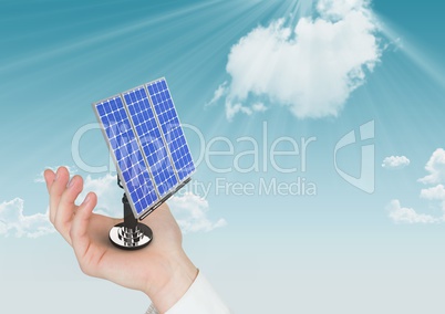 Digital composite image of solar panel on hand against sky