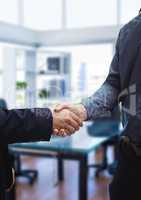 businessmen handshake in the meeting room
