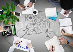 Overhead of business team with grey background and hands and cog graphic