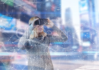 Woman using 3D glasses to see an interface in a futuristic room