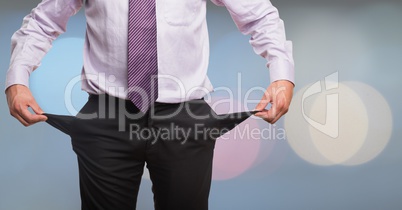 Businessman with pink shirt and empty pocket, blur lights background