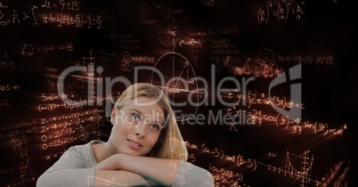 Thoughtful woman looking away against math graphics