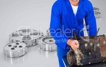 Mechanic working on his machine