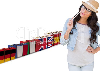 main language flag suitcases behind young woman with hat.