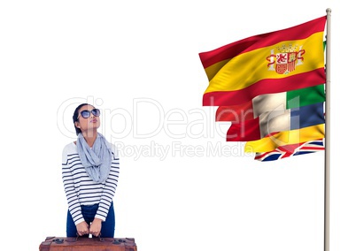 main language flags near young woman with suitcase and sun glasses