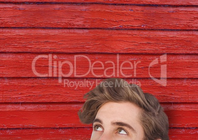 hipster man surprise  with red wood background