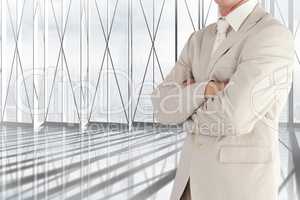Businessman crossing his hands in office