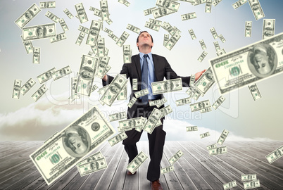 Businessman with falling money