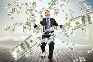 Businessman with falling money