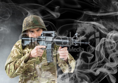 soldier with weapon . black back and smoke around