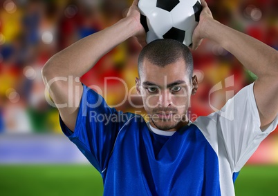 soccer player throwing in , in front of the fans