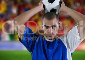 soccer player throwing in , in front of the fans