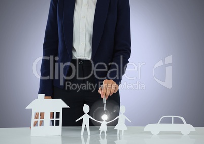 Cut outs of house family and car with model
