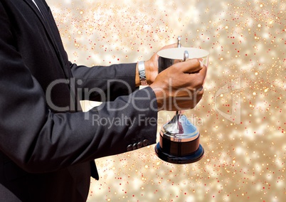business hand with trophy, golden back