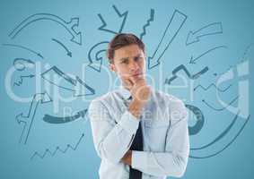 Business man thinking against arrow graphics and blue background