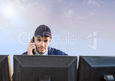 Security man on bright background computers with cloudy sky