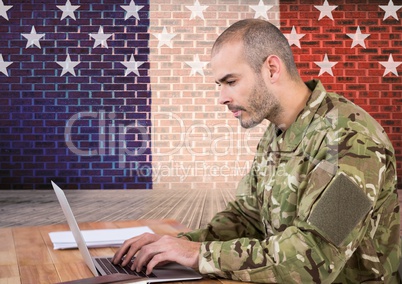 soldier studding in front of usa flag